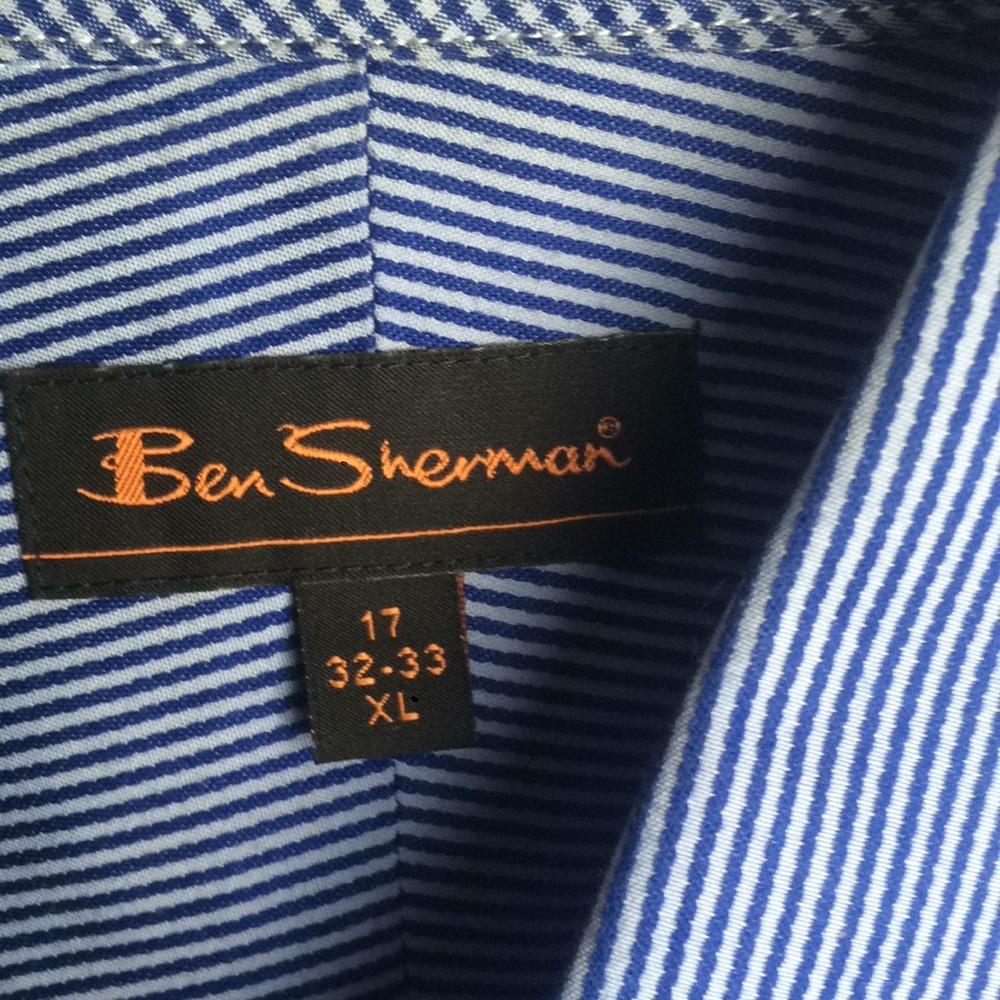 Long sleeve blue/white stripe button up.